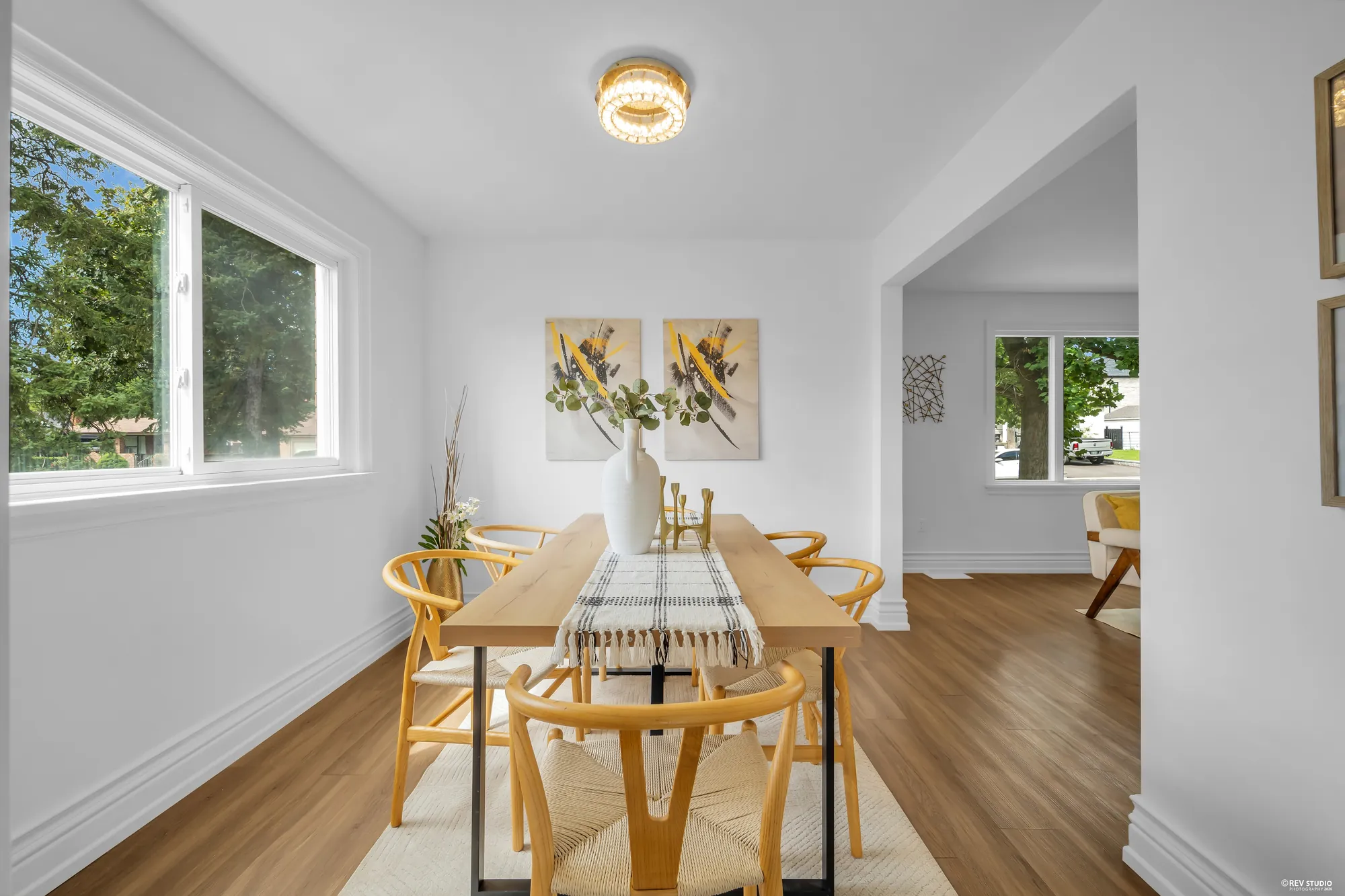 The dining room with a window on the side wall