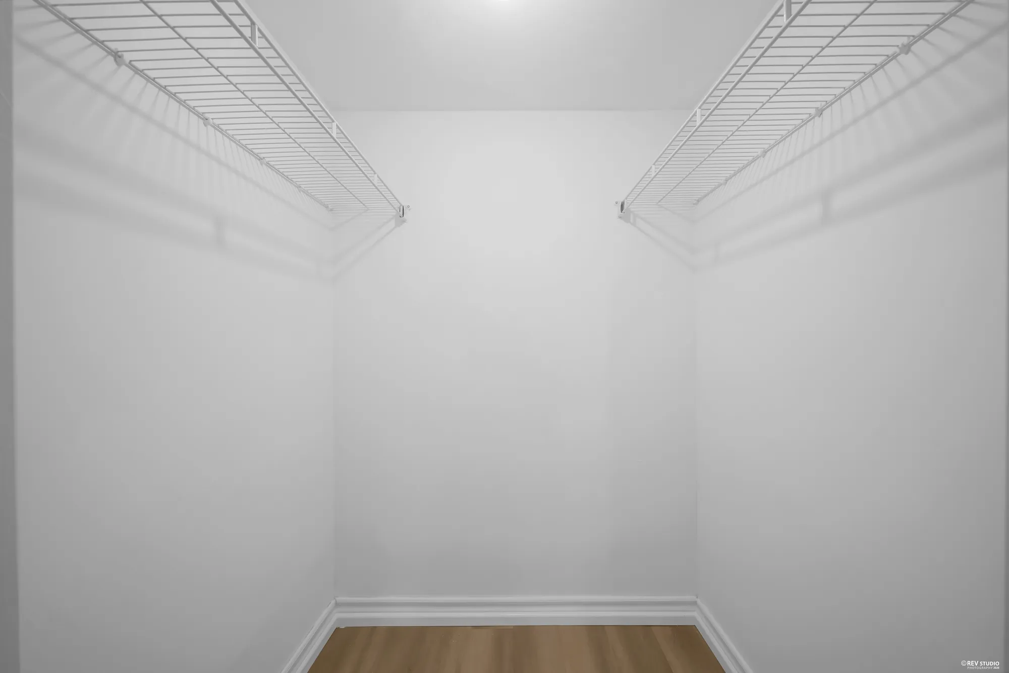 A storage room fitted out with wire shelving